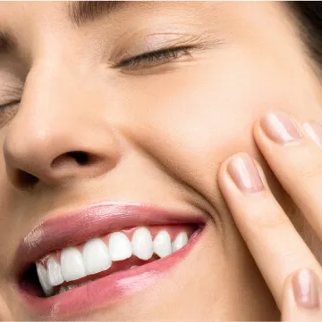 Imagen de una sonrisa radiante y encantadora después de recibir tratamiento en Nossa Dentista.